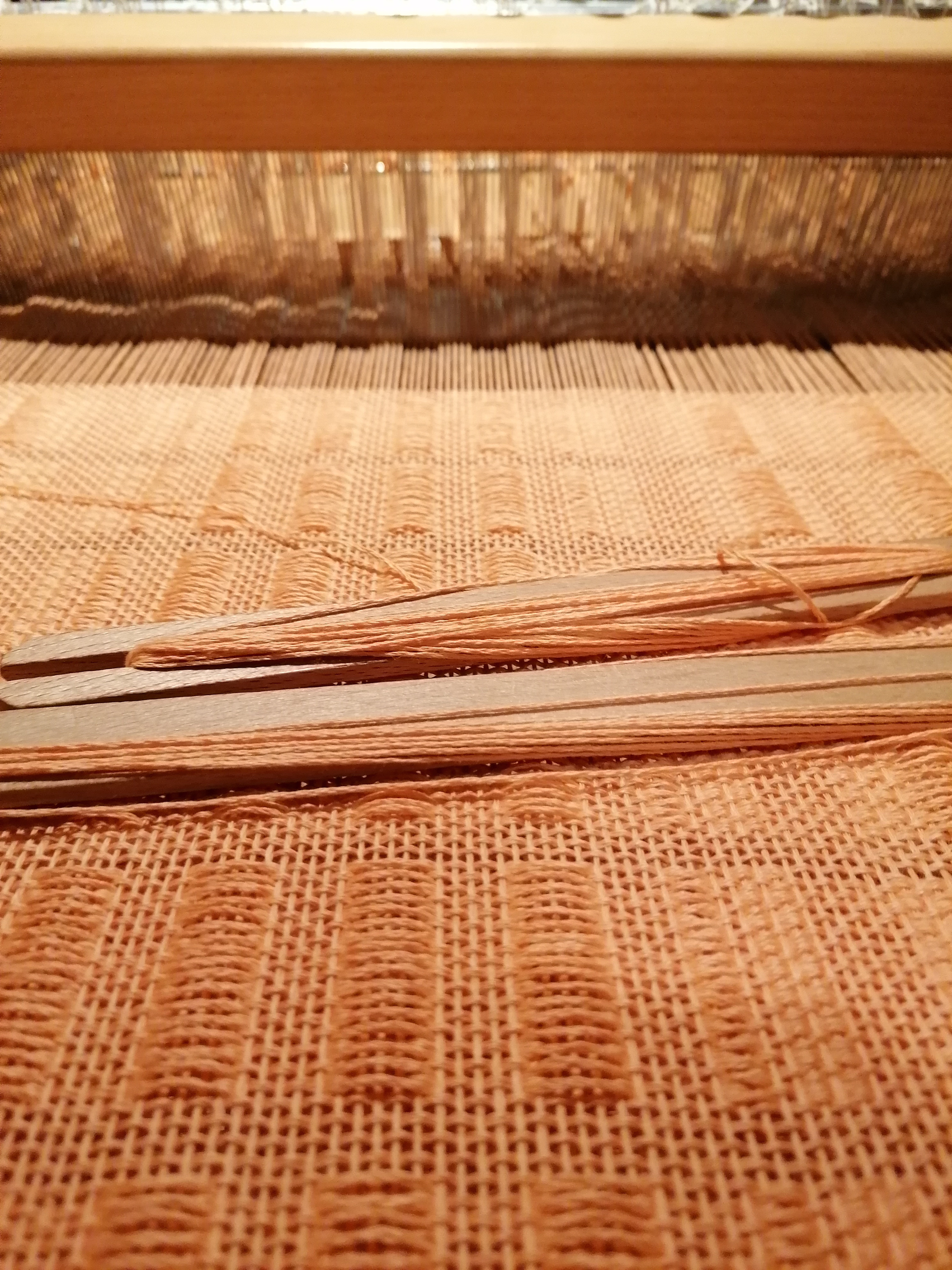Apricot detail on loom