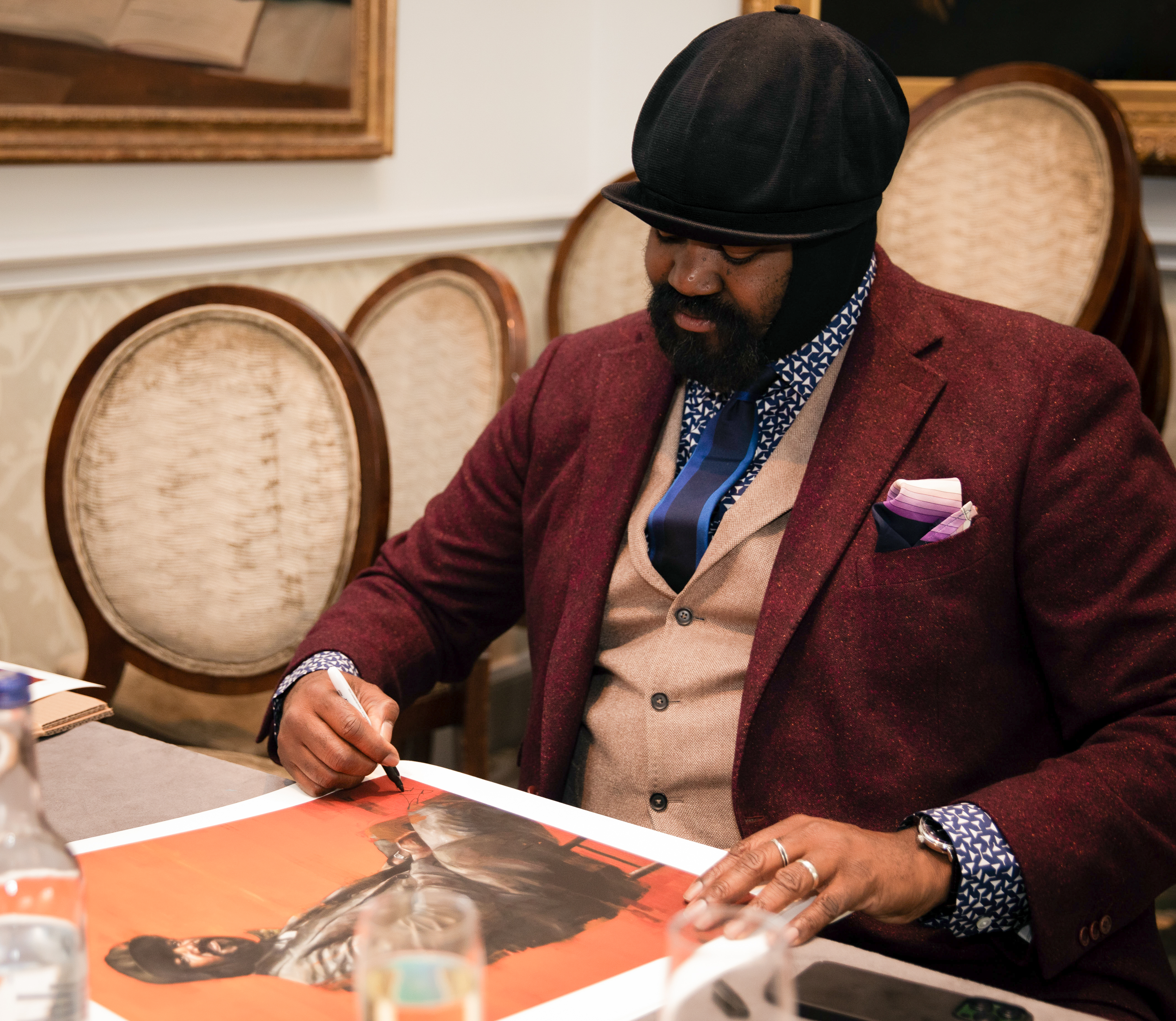 Gregory pictured signing this Limited Edition Print 